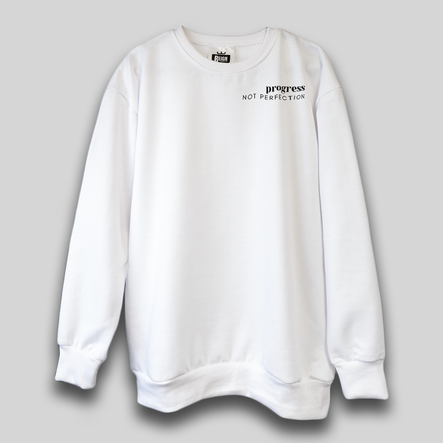 PROGRESS, NOT PERFECTION Relaxed Fit Sweatshirt